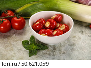 Sweet piquant cherry pepper stuffed cheese. Стоковое фото, фотограф Андрей Старостин / Фотобанк Лори