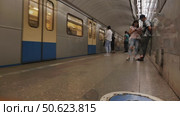 Moscow, Russia - June 17, 2024: Tourists waiting for subway train in Moscow Metro station. Редакционное видео, видеограф Mikhail Davidovich / Фотобанк Лори