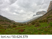 Panoramic view of Baksan gorge in low clouds with power line. September. Weather. Стоковое фото, фотограф Роман Дзюбало / Фотобанк Лори