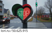 Funny and conceptual traffic light on road crossing, Iceland changes from green to red. The stop signal in shape of heart. Concept relationship, romantic date and tenderness. St Valentine vibes. Стоковое AI-видео, аниматор Sergey Grishin / Фотобанк Лори