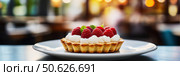 Appetizing raspberry tart and mint. Raspberry danish cake on plate on table and coffee. Tartlets raspberry fruit with vanilla custard, whipped cream served in a cafe. Blurred bokeh interior background. Стоковое AI-изображение, AI-художник Марина Демидюк / Фотобанк Лори