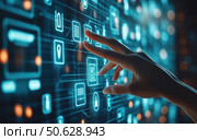 A hand is touching a computer screen with a blue background. Стоковое фото, фотограф Ярославский Максим / Фотобанк Лори