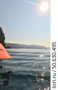 Kayaking Sea Sunlight: Paddle strokes water, sunny day, sea kayaking to island on a relaxing vacation. Стоковое видео, видеограф svetograph / Фотобанк Лори