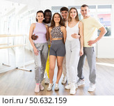 Slim men and woman posing collectively in training hall. Стоковое фото, фотограф Яков Филимонов / Фотобанк Лори