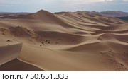 Aerial view of sand dunes in desert at sunset. Стоковое фото, фотограф Михаил Коханчиков / Фотобанк Лори