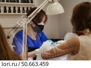 Delicate Manicuring at the Nail Studio During Daytime Lifestyle Moment. Стоковое фото, фотограф Aleksandr Golubev / Фотобанк Лори