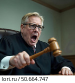 Judge shouting with gavel raised. Стоковое AI-изображение, AI-художник RamA / Фотобанк Лори
