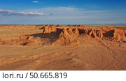Bayanzag flaming cliffs at sunset in Mongolia. Стоковое фото, фотограф Михаил Коханчиков / Фотобанк Лори