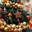Beautiful Christmas background. Holiday toys on the Christmas tree. Concept of preparing decorations and furnishings for the New Year. New Year's card 2026. Стоковое фото, фотограф Photojuli / Фотобанк Лори