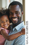 Happy african black father holding embracing cute little child daughter. Стоковое AI-видео, аниматор Sergey Grishin / Фотобанк Лори