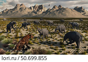 A Sabre-Toothed Tiger stalks a herd of Deinotherium. Стоковое фото, фотограф Mark Stevenson/Stocktrek Images / ТАСС / Фотобанк Лори