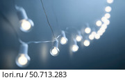twinkle white string lights. Стоковое фото, фотограф Vectorwin / Фотобанк Лори