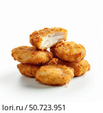 Delicious crispy chicken nuggets piled high on white background. Стоковое AI-изображение, AI-художник Иван Рябоконь / Фотобанк Лори
