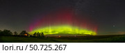 An auroral arc of a Kp4 level aurora from southern Alberta, Canada. Стоковое фото, фотограф Alan Dyer/Stocktrek Images / ТАСС / Фотобанк Лори