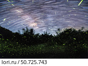 Star and firefly trails at Fujian Tulou in China. Стоковое фото, фотограф Jeff Dai/Stocktrek Images / ТАСС / Фотобанк Лори
