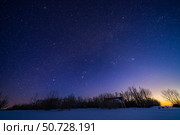 The winter sky with Orion setting into the west in the evening twilight, Alberta, Canada. Стоковое фото, фотограф Alan Dyer/Stocktrek Images / ТАСС / Фотобанк Лори