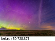 Appearance of the infamous STEVE glowing arc south of the main auroral curtains, southern Alberta, Canada. Стоковое фото, фотограф Alan Dyer/Stocktrek Images / ТАСС / Фотобанк Лори