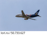 Take-off of the Sukhoi SuperJet 100-95LR aircraft of Severstal Airlines with tail number RA-89117. Редакционное фото, фотограф Сергей Сергеев / Фотобанк Лори