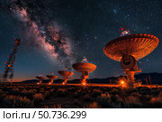 Radio telescopes exploring the milky way at night. Стоковое AI-изображение, AI-художник Иван Рябоконь / Фотобанк Лори