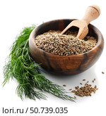 Cumin seeds in wooden bowl with scoop and dill. Стоковое AI-изображение, AI-художник Иван Рябоконь / Фотобанк Лори