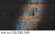 Hieroglyphic carvings and paintings on wall (2023 год). Стоковое видео, видеограф Михаил Коханчиков / Фотобанк Лори