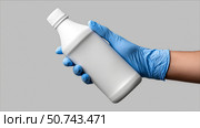 Using cleaning solution with gloves in a safe setting. Стоковое AI-изображение, AI-художник Katsiaryna Repich / Фотобанк Лори