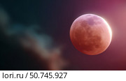 Lunar eclipse casts reddish glow over night sky with clouds in the background. Стоковое AI-изображение, AI-художник Сергей Толмачёв / Фотобанк Лори