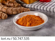 Indian tumeric cumin dry powder. Стоковое фото, фотограф Андрей Старостин / Фотобанк Лори