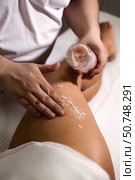 Relaxing Thigh Massage With Natural Scrub Indoors for Rejuvenation and Skin Care. Стоковое фото, фотограф Aleksandr Golubev / Фотобанк Лори