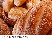Fresh baked bread. Assorted bakery products loafs of bread and rolls... Стоковое фото, фотограф Андрей Армягов / Фотобанк Лори