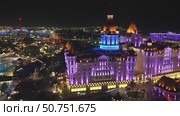 Night View Harbin Wanda Castle Hotel China: Illuminated Luxury Resort Architecture. Стоковое видео, видеограф svetograph / Фотобанк Лори