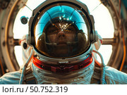 Astronaut wearing space suit and helmet exploring space station, reflecting lights in visor. Стоковое AI-изображение, AI-художник Иван Рябоконь / Фотобанк Лори