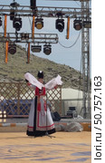 ELANTSY, IRKUTSK REGION, RUSSIA - July 5, 2025: Erdynskie Games– festival of nomadic peoples of Eurasia on coast of Baikal Lake. Vertical video of beautiful Buryat girl in national costume on open stage in Beauty Contest. Редакционное видео, видеограф Виктория Катьянова / Фотобанк Лори