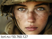 Young female soldier showing courage and determination, portrait of a combatant. Стоковое AI-изображение, AI-художник Иван Рябоконь / Фотобанк Лори