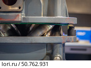 Cross section of a screw compressor showing intermeshing rotors. Стоковое фото, фотограф Юрий Поздников / Фотобанк Лори