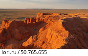 Bayanzag flaming cliffs at sunset in Mongolia. Стоковое фото, фотограф Михаил Коханчиков / Фотобанк Лори