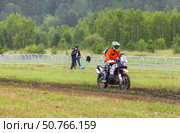 ANGARSK, IRKUTSK REGION, RUSSIA — July 13, 2025: XV International Silk Way Rally, motorcycle racing competition. Race on high-speed special stage in Angarsk. Rider №59 Grigory Lein on dirt track. Редакционное фото, фотограф Виктория Катьянова / Фотобанк Лори
