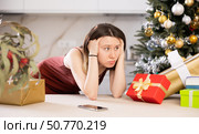 Portrait of a frustrated young woman at home. Стоковое фото, фотограф Яков Филимонов / Фотобанк Лори
