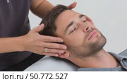 Physiotherapist massaging patient's head on white background. Стоковое AI-видео, аниматор Юрий Поздников / Фотобанк Лори