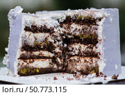 Cake in the cut, chocolate cake with Dubai chocolate filling, piece of cake, dessert for tea, birthday cake, sponge cake with cream. Стоковое фото, фотограф Photojuli / Фотобанк Лори