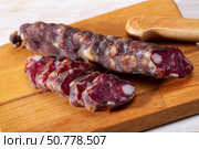 French sausage jerked closeup. Стоковое фото, фотограф Яков Филимонов / Фотобанк Лори