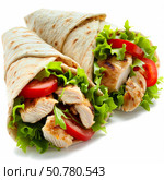 Tortillas filled with grilled chicken, lettuce and tomato slices. Стоковое AI-изображение, AI-художник Иван Рябоконь / Фотобанк Лори