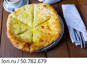 Delicious dish khachapuri Iveria with suluguni cheese. Стоковое фото, фотограф Яков Филимонов / Фотобанк Лори