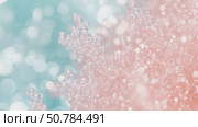 Glittering abstract bokeh in soft peach and blue tones, perfect for festive background. Стоковое AI-видео, аниматор Анастасия Золотницкая / Фотобанк Лори