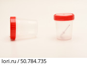 Jars for urine and fecal tests. Containers for medical tests. Стоковое фото, фотограф Valeriy Lushchikov / Фотобанк Лори