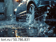 Car driving through puddle splashing water on wet road. Стоковое AI-изображение, AI-художник Иван Рябоконь / Фотобанк Лори