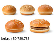 A variety of burger buns with golden crusts and sesame seeds. Стоковое AI-изображение, AI-художник Наталья Синцова / Фотобанк Лори