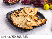 Indian stuffed potato bread Paratha. Стоковое фото, фотограф Андрей Старостин / Фотобанк Лори