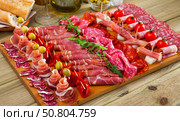 Slices of Spanish gammon, sausages, bacon. Стоковое фото, фотограф Яков Филимонов / Фотобанк Лори