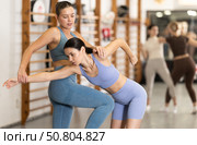 Young girl practicing self-defense techniques in pair. Стоковое фото, фотограф Яков Филимонов / Фотобанк Лори
